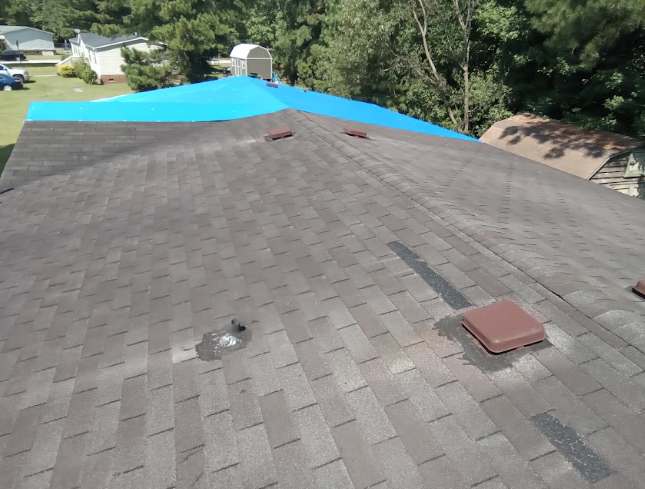 A new metal roof installation in progress